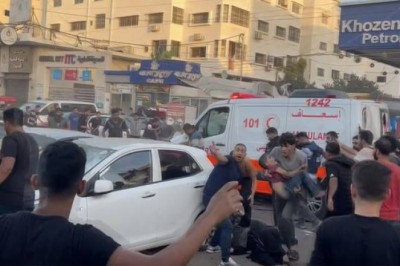 13 dead, 26 injured in 'massacre' as Israel bombs Gaza ambulances 26 injured in 'massacre' as Israel bombs Gaza ambulances